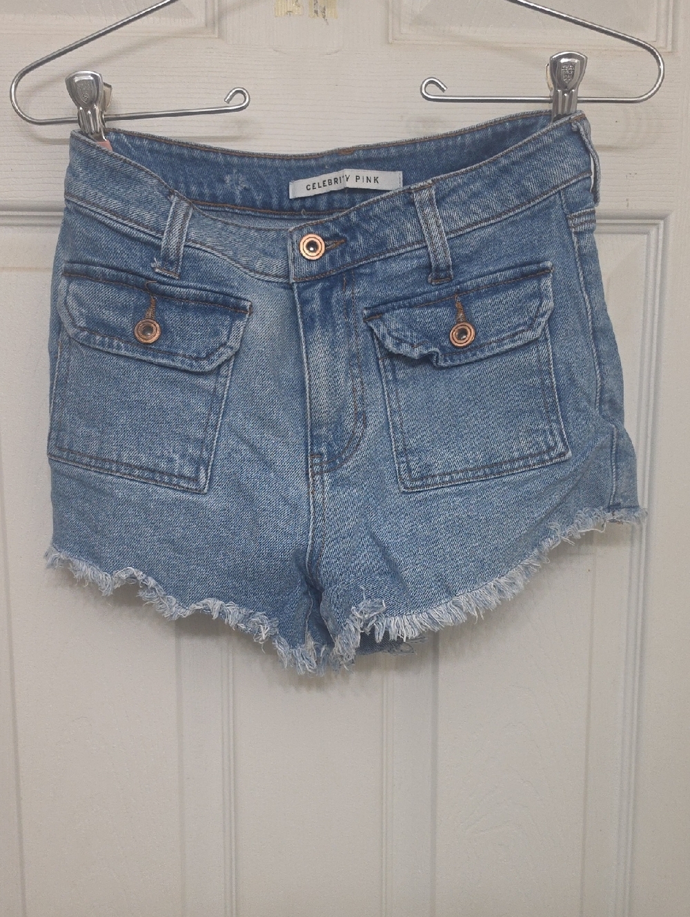 Celebrity Pink Light Wash Denim Cutoff Shorts with Flap Pockets
